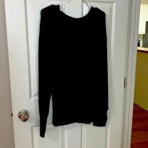 Backless sweater. Ties on the neck